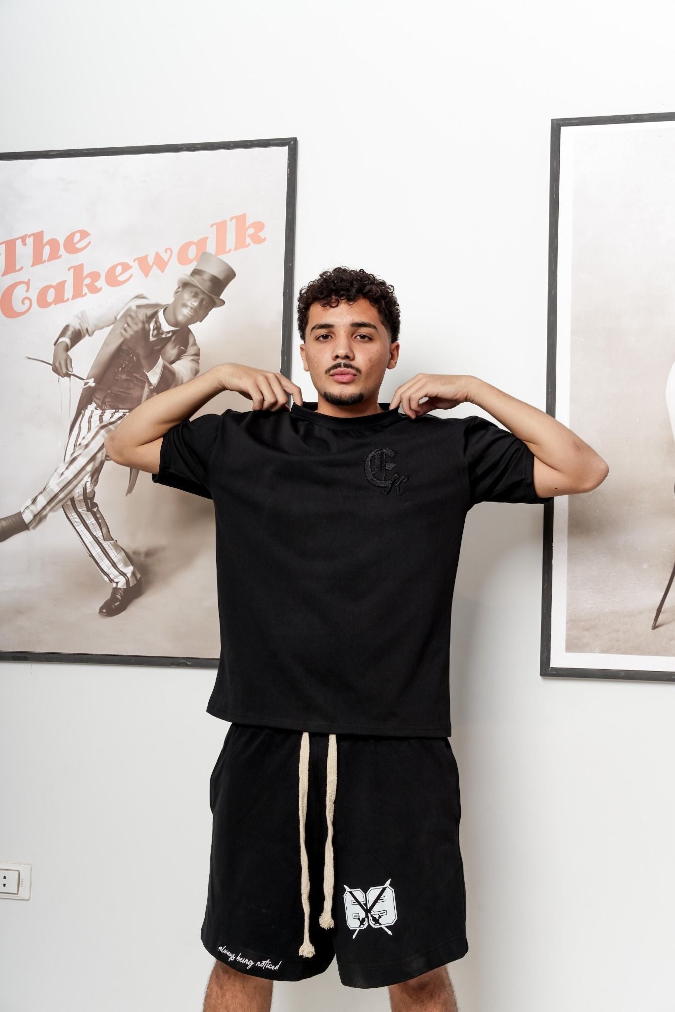 Replace Black Tee